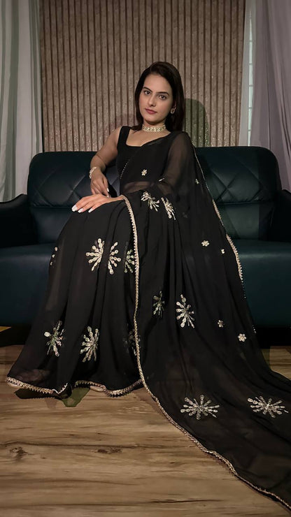 Sleek Black Saree with Light Embellishments