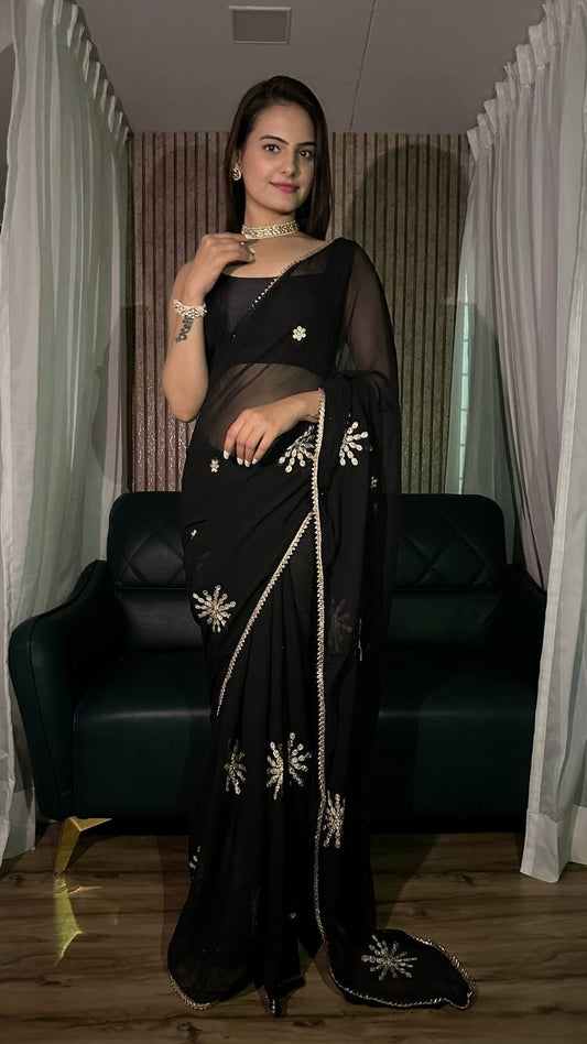 Sleek Black Saree with Light Embellishments